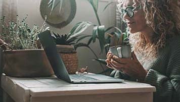 woman with laptop and coffee