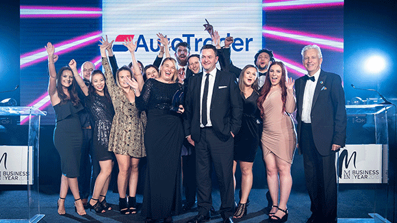 Auto Trader celebrating their MEN Business of the Year Awards win