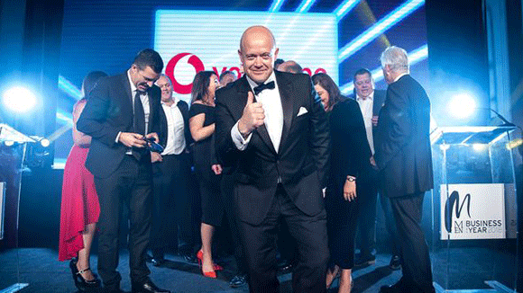Man giving thumbs up after his company won the MEN Business of the Year Awards