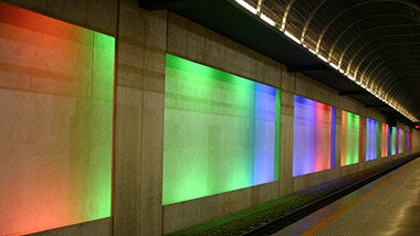 Neon lights near a train track