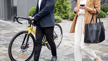 man woman yellow bike