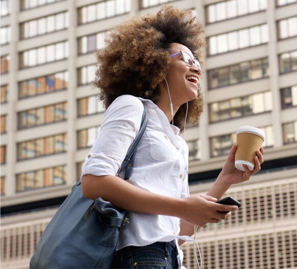 woman smiling building