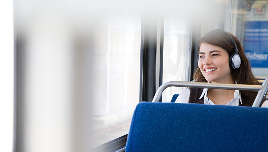 woman smiling on bus