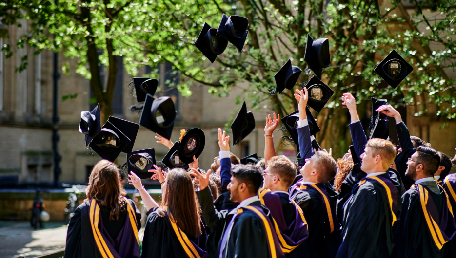 Group of university graduates celebrating