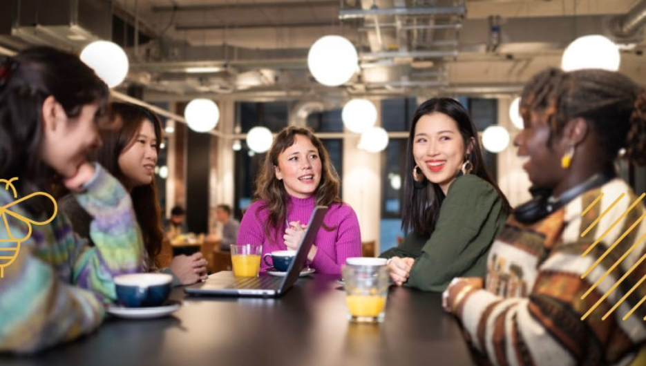 group of collegues chatting around a table