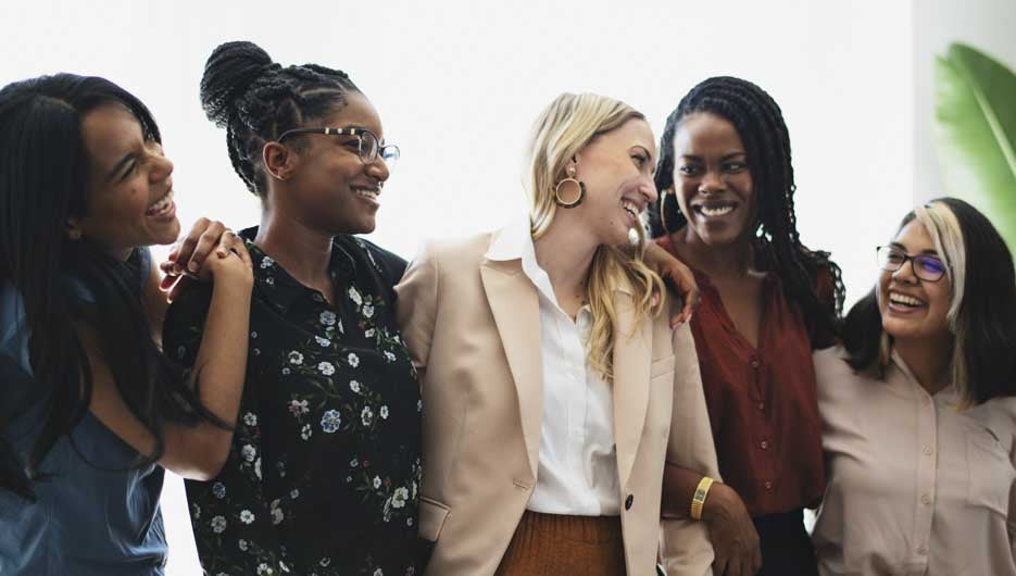 Diverse confident businesswomen standing together