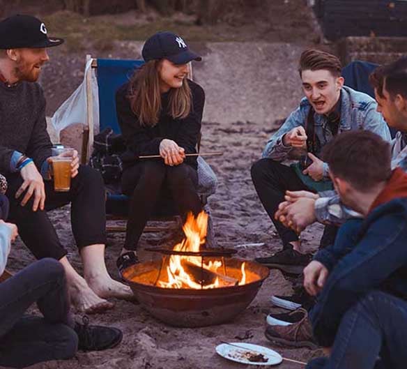 people outdoors having bbq